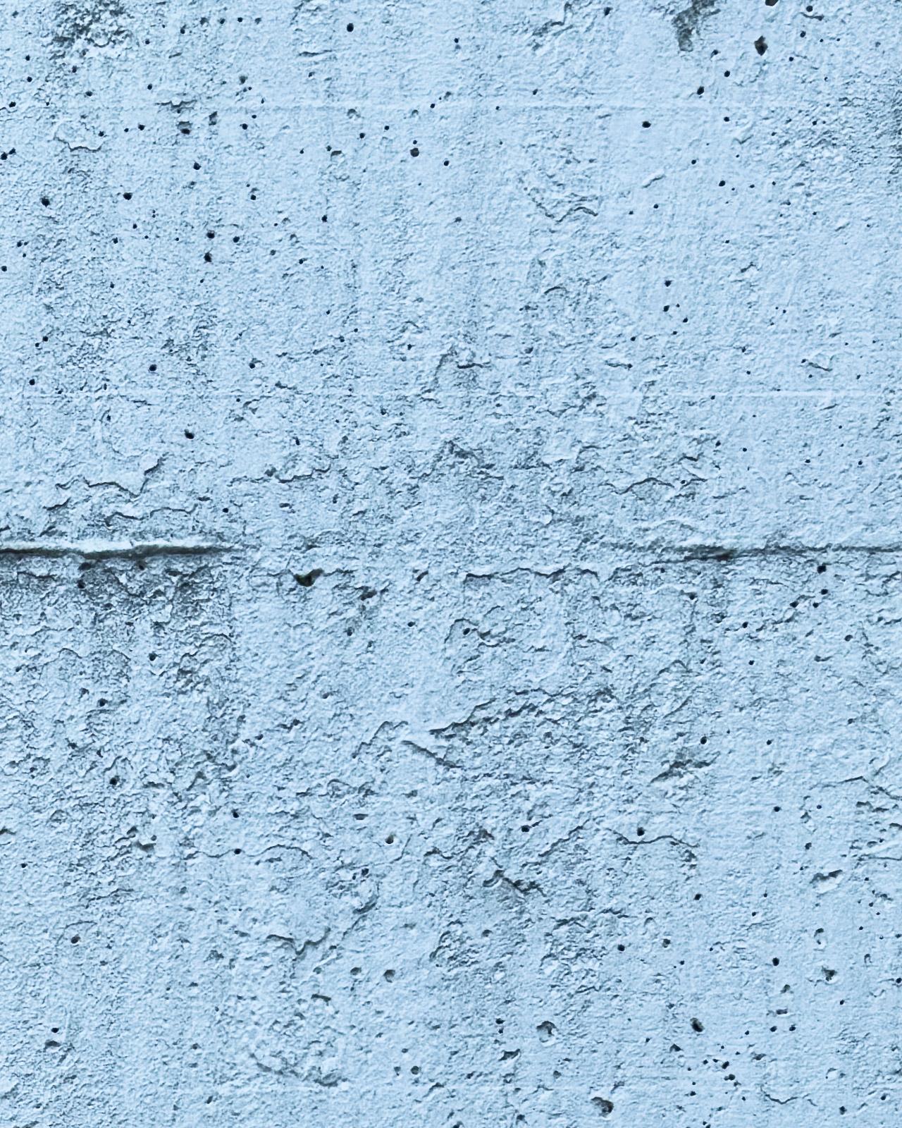 Weathered concrete wall surface in Zeltweg.